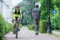 Bike and scooter on the bike road with blue road sign or signal of bicycle lane Royalty Free Stock Photo