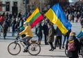 People with Ukrainian and Lithuanian flags