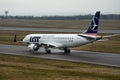 Polish Airlines LOT aircraft on runway after landing in Vilnius international airport, Lithuania. SP-LMB Embraer E190STD