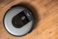 Vilnius, Lithuania - May 05 2021: iRobot Roomba i7 on a wooden floor, illustrative editorial Royalty Free Stock Photo