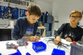 Vilnius, Lithuania - November 23, 2018: Kids making Lego robot mindstorms. Robotic, learning, technology, stem education