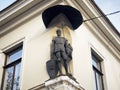 Statue of a Knight - The City Gatekeeper - on a house in Vilnius Old Town. Royalty Free Stock Photo