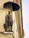 Statue of a Knight - The City Gatekeeper - on a house in Vilnius Old Town.