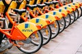 Vilnius, Lithuania. Row Of Colorful Bicycles AVIVA For Rent At Municipal Bike Parking In Street. Royalty Free Stock Photo