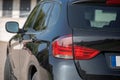 VILNIUS, LITHUANIA - SEPTEMBER 20, 2020: BMW X1 2012 Year Vehicle in Dark Back Windows