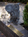 A bronze dwarf Zyczliwek statue in Bernardine Garden, Vilnius, Lithuania. Royalty Free Stock Photo