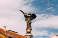 Vilnius, Lithuania. Statue Of An Angel Blowing A Trumpet In Main Square Against A Sunny Blue Sky In Uzupis District Royalty Free Stock Photo
