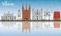 Vilnius Skyline with Gray Landmarks, Blue Sky and Reflections.