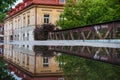 Vilnius Uzupis District and Bridge with Water Reflection. Lithuania.