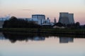 Vilvoorde, Flemish Brabant Region, Belgium - Industrial power plant reflecting in the water of the canal at dusk