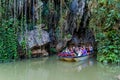 VINALES, CUBA - FEB 18, 2016: Tourists in a boat are leaving Cueva del Indio cave in National Park Vinales, Cub