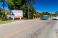 VINALES, CUBA - FEB 18, 2016: Vintage car and a propaganda poster near Vinales village, Cuba. It says: The dreams of all