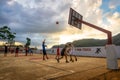 Vinales, Cuba - February 06, 2023: Local boys challenge in a outdoor Basketball Game at sunset Royalty Free Stock Photo