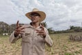 VINALES, CUBA - MARCH 14, 2018. Cuban with a white hat on a tobacco farm. Royalty Free Stock Photo