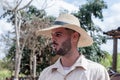 VINALES, CUBA - MARCH 14, 2018. Cuban with a white hat on a tobacco farm.