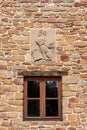 VINCI, ITALY - SEPTEMBER 19, 2023 - Birth house of genius Leonardo da Vinci, the family code of arms above a window