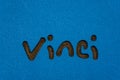 Vinci logo on blue plastic