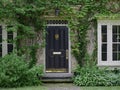 Vine covered entrance of old brick house