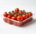Vine-Fresh Cherry Tomatoes in Clear Plastic Pack for Salads and Snacking Royalty Free Stock Photo