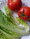 Vine tomatos and lettuce Royalty Free Stock Photo