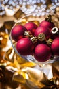 Vineglass with red christmas baubles Royalty Free Stock Photo
