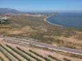 Vineyard, mountains, blue skies and lagoon