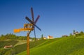 Vineyards and windmill along South Styrian Wine Road, a charming region on the border between Austria and Slovenia with green