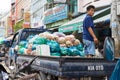 Vinh Long, Vietnam - Nov 30, 2014: Light deliver truck loaded full with tropical fruits at Vinh Long market, Mekong delta