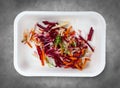 Vinigret salad. Vegetarian food. Takeaway food. Top view, on a gray background Royalty Free Stock Photo