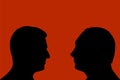 Vinnitsa March 5, 2022 Silhouette Vladimir Putin and Vladimir Zelensky on a red background