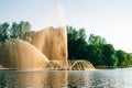 Vinnitsa, Ukraine. Dancing fountain on the river. Beautiful fountain on sunset background