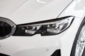 Vinnitsa, Ukraine - February 24, 2021. Headlight of BMW Series 3 - new model car presentation in showroom Royalty Free Stock Photo