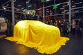 Vinnitsa, Ukraine - March 21, 2018. Renault Kadjar hidden under yellow cover - new model car presentation in showroom