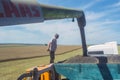 Process of harvesting by harvesters. plants in reapers. truck unloading