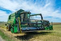 Process of harvesting by harvesters. plants in reapers. truck unloading