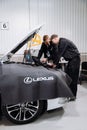 Vinnitsya, Ukraine - 15 of May 2025: Lexus technicians run engine diagnostics in service bay Royalty Free Stock Photo