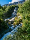 Vinnufossen, a beautiful waterfall flushing down a mountainside in Sunndal, Norway