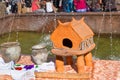 Exhibition of ancient local dinnerware, restored authentic clay dishes of the Trypillya culture and scale copy of a house