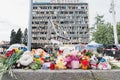 16.07.22 Vinnytsia, Ukraine. Flowers and children toys at the place where the children died. In the background, a civilian