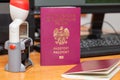 Vinous biometric passport of a Polish citizen with a border date stamper, close-up. Inscription - European Union, Republic of