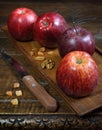 Vinous Gala apples on an old wooden surface