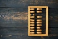 Vintage abacus on wooden background with copy space Royalty Free Stock Photo
