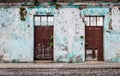 Vintage abandoned colonial building with plants growing out of the cracked walls, Antigua, Guatemala Royalty Free Stock Photo