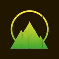 Vintage abstract scratched green emblem of mountain with halo