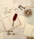 Vintage accessories, open book, old letters and documents retro Royalty Free Stock Photo