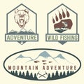 vintage adventure labels with bear,salmon and mountains