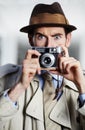 Vintage agent man, street and camera for investigation, inspection or suspicious journalist at job. Private investigator Royalty Free Stock Photo