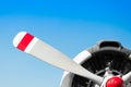 A Vintage airplane propeller with radial engine on blue sky Royalty Free Stock Photo