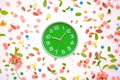 Vintage alarm clock flat lay with colorful springtime decoration Royalty Free Stock Photo