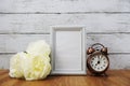 Vintage alarm clock and space photo frame Royalty Free Stock Photo